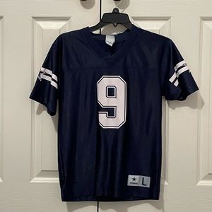 Dark blue, authentic Cowboys jersey, youth large, #9, played by Tony Romo.